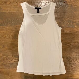 White tank with cut out above the chest!
